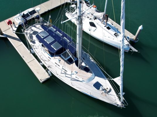 Drone view of bimini structure with 744 W solar panel Solbian on Hallberg Rassy 46