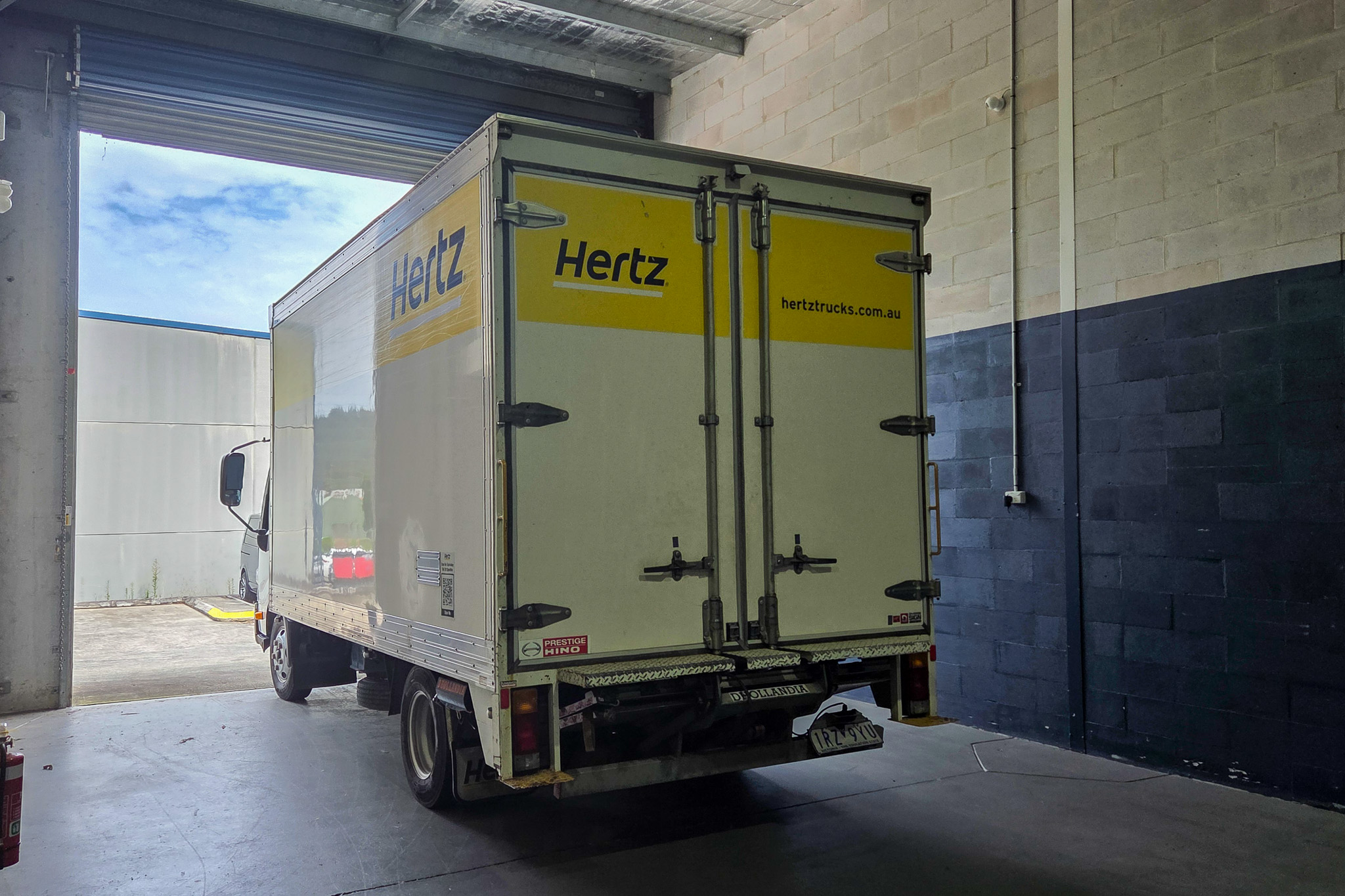 Removal truck backing into the loading bay of Ocean Covers' new Central Coast workshop